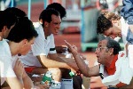 Canada's Trevor Clarke coaching the men's field hockey team discusses strategy at the 1988 Seoul Olympic Games. (CP Photo/ COA/ T. Grant)
