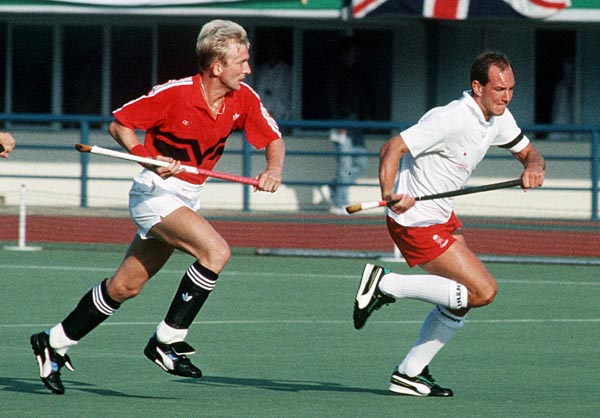 Canada's Ross Rutledge (right) plays field hockey at the 1988 Seoul Olympic Games. (CP Photo/ COA/ T. Grant)