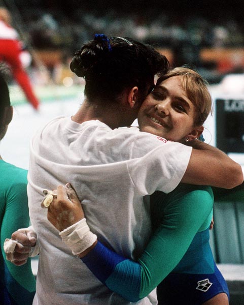 Canada's Monica Covacci (left) and Janine Rankin embrace during gymnastics event at the 1988 Olympic games in Seoul. (CP PHOTO/ COA/ Tim O'lett)