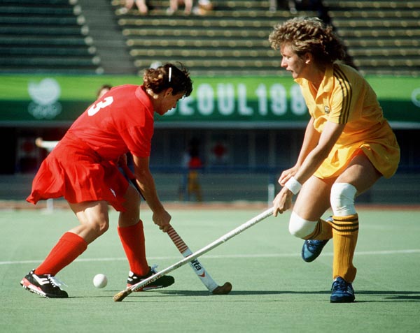 Canada's Deb Covey (left) plays field hockey at the 1988 Seoul Olympic Games. (CP Photo/ COA/ T. Grant)