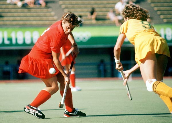 Canada's Deb Covey (left) plays field hockey at the 1988 Seoul Olympic Games. (CP Photo/ COA/ T. Grant)