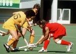 Canada's Sandra Levy,  Sara Ballantyne (#15) and Laura Branchaud (#5) play field hockey at the 1988 Seoul Olympic Games. (CP Photo/ COA/ T. Grant)