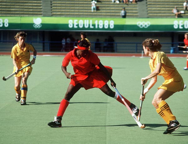 Canada's Sandra Levy (centre) plays field hockey at the 1988 Seoul Olympic Games. (CP Photo/ COA/ T. Grant)
