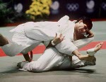 Canada's Nicolas Gill (left) competes in the judo event of the 2000 Sydney Olympic Games. (CP Photo/ COA)