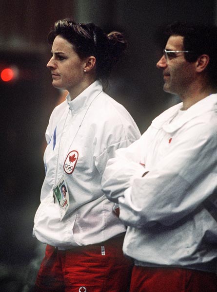 Canada's Marie-Huguette Cormier and Dr. Germain Theriault watch the fencing event at the 1988 Olympic games in Seoul. (CP PHOTO/ COA/ F.S.G.)