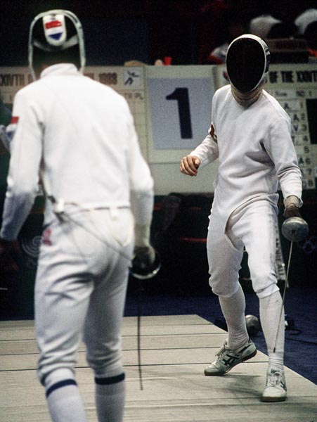 Canada's Alain Cote (right) competes in the fencing event at the 1988 Olympic games in Seoul. (CP PHOTO/ COA/ F.S.G.)