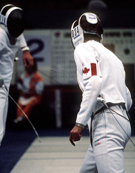 Canada's Michel Dessureault (right) competes in the fencing event at the 1988 Olympic games in Seoul. (CP PHOTO/ COA/ F.S.G.)