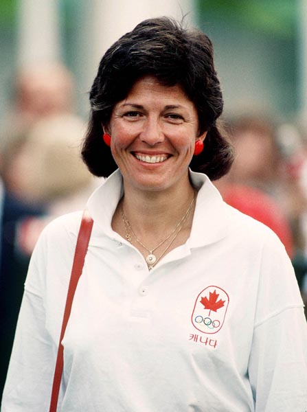 Canada's Susan Nattrass (Shooting) attends the flag raising ceremony at the 1988 Olympic games in Seoul. (CP PHOTO/ COA/ Cromby McNeil)