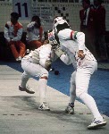Canada's Madeleine Philion (left) competing in the fencing  event at the 1988 Olympic games in Seoul. (CP PHOTO/ COA/ Tim O'Lett)