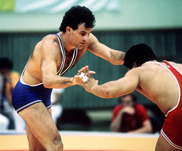 Canada's Chris Rinke (left) competes in the freestyle wrestling event at the 1988 Seoul Olympic Games. (CP PHOTO/COA/C. McNeil)