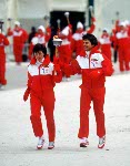 Canada's Cathy Preistner and Ken Read run with the olympic flame during the opening ceremonies of the 1988 Winter Olympics in Calgary. (CP PHOTO/COA/ T. O'lett)