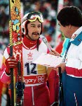Canada's Steve Collins gives an interview during the ski jumping event at the 1988 Winter Olympics in Calgary. (CP PHOTO/COA/ J. Gibson)