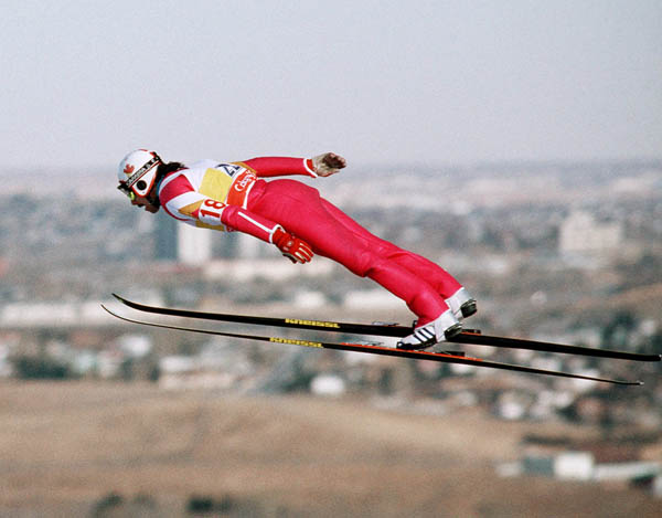 Canada's Steve Collins participates in the ski jumping event at the 1988 Winter Olympics in Calgary. (CP PHOTO/COA/ J. Gibson)
