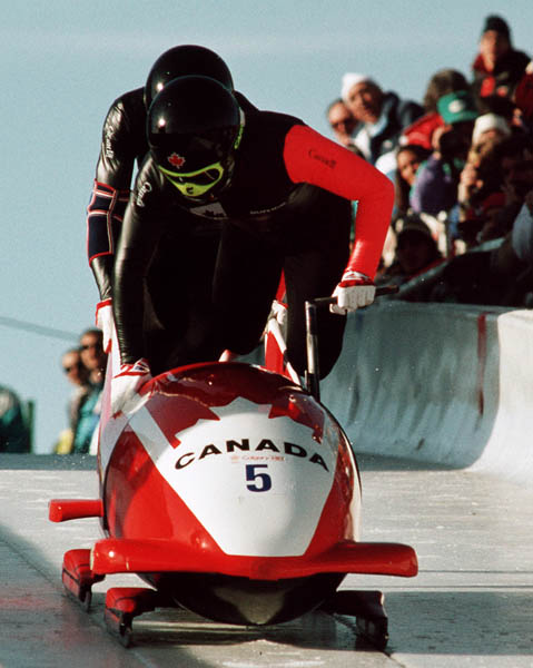Canada's Greg Haydenluck and Lloyd Guss compete in the two man bobsleigh event at the 1988 Calgary Winter Olympics. (CP PHOTO/ COA/ T. O'lett)