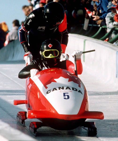 Canada's Greg Haydenluck and Lloyd Guss compete in the two man bobsleigh event at the 1988 Calgary Winter Olympics. (CP PHOTO/ COA/ T. O'lett)