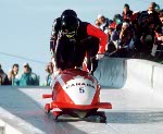 (A l'avant) Greg  Haydenluck, Cal Langford, Kevin Tyler et Lloyd Guss du Canada participent  l'preuve de bobsleigh  quatre aux Jeux olympiques d'hiver de Calgary de 1988. (PC Photo/AOC)