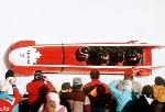 Canada's Chris Lori, Ken Leblanc, Andrew Swim and Howard Dell compete in the four man bobsleigh event at the 1988 Calgary Winter Olympics. (CP PHOTO/ COA/ T. O'lett)