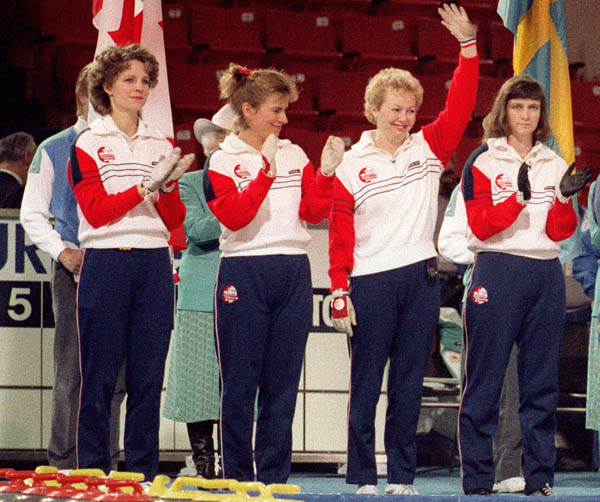 Canada's Penny Ryan, Debbie Jones, Lindsay Sparkes and Linda Moore compete in the curling event at the 1988 Calgary Olympic winter Games. (CP PHOTO/COA/Ted Grant)