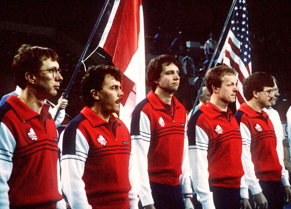 The Canadian men's curling team celebrate their silver medal win in the curling event at the 1988 Calgary Olympic winter Games. (CP PHOTO/COA/Ted Grant)