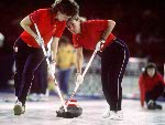 Canada's Penny Ryan (left) and Debbie Jones compete in the curling event at the 1988 Calgary Olympic winter Games. (CP PHOTO/COA/Ted Grant)