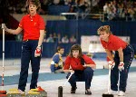 (From left) Canada's Penny Ryan, Linda Moore and Debbie Jones compete in the curling event at the 1988 Calgary Olympic winter Games. (CP PHOTO/COA/Ted Grant)