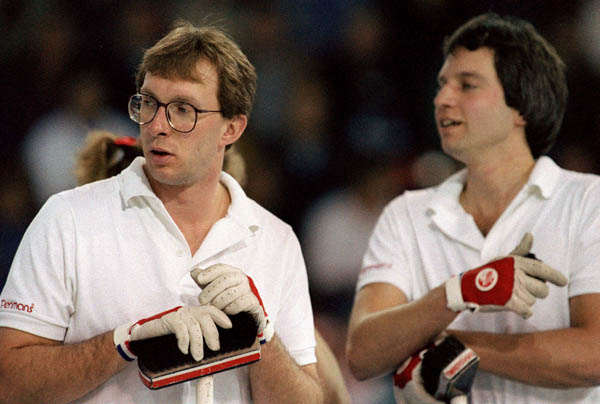 Canada's Neil Houston and Brent Syme compete in the curling event at the 1988 Calgary Olympic winter Games. (CP PHOTO/COA/Ted Grant)