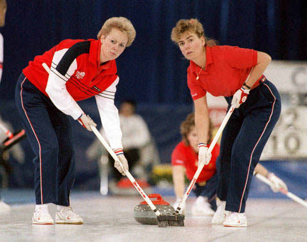 (From left to right) Canada's Lindsay Sparkes, Penny Ryan and Debbie Jones compete in the curling event at the 1988 Calgary Olympic winter Games. (CP PHOTO/COA/Ted Grant)