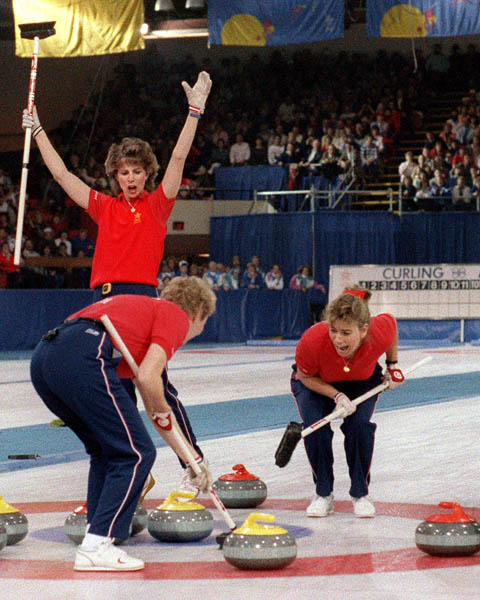 (From left) Canada's Penny Ryan, Lindsay Sparkes and Debbie Jones compete in the curling event at the 1988 Calgary Olympic winter Games. (CP PHOTO/COA/Ted Grant)