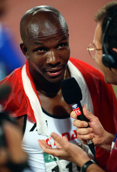 Canada's Donovan Bailey celebrates the gold medal won in the men's 100m at the 1996 Atlanta Summer Olympic Games. (CP PHOTO/COA/Claus Andersen)