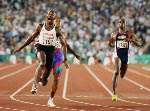 Canada's Arturo Huerta (centre) competes in an athletics event at the 1996 Olympic games in Atlanta. (CP PHOTO/ COA/Claus Andersen)