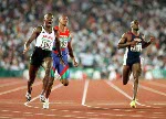 Canada's Arturo Huerta (centre) competes in an athletics event at the 1996 Olympic games in Atlanta. (CP PHOTO/ COA/Claus Andersen)