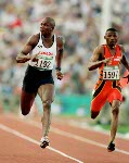 Canada's Arturo Huerta (centre) competes in an athletics event at the 1996 Olympic games in Atlanta. (CP PHOTO/ COA/Claus Andersen)