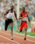 Canada's Arturo Huerta (centre) competes in an athletics event at the 1996 Olympic games in Atlanta. (CP PHOTO/ COA/Claus Andersen)