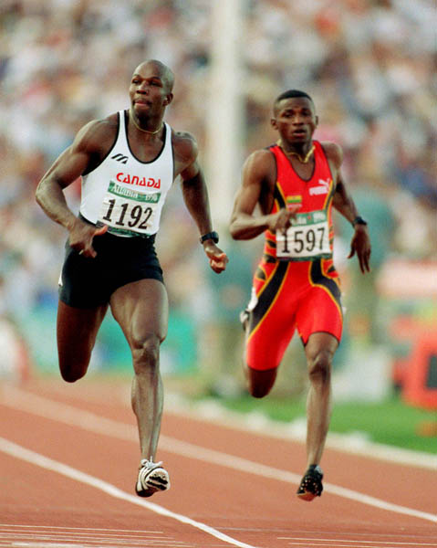 Canada's Donovan Bailey (left) competes in the men's 100m event at the 1996 Atlanta Summer Olympic Games. (CP PHOTO/COA/Claus Andersen)