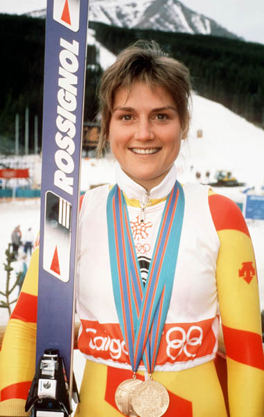 Canada's Karen Percy celebrates her second bronze medal win in an alpine ski event at the 1988 Winter Olympics in Calgary. (CP PHOTO/ COA/Crombie McNeil)