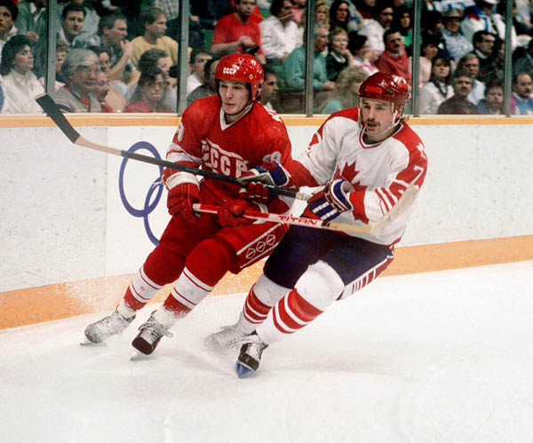 Canada's Wallace Schreiber (#7) participates in the hockey event at the 1988 Winter Olympics in Calgary. (CP PHOTO/ COA/ S.Grant)