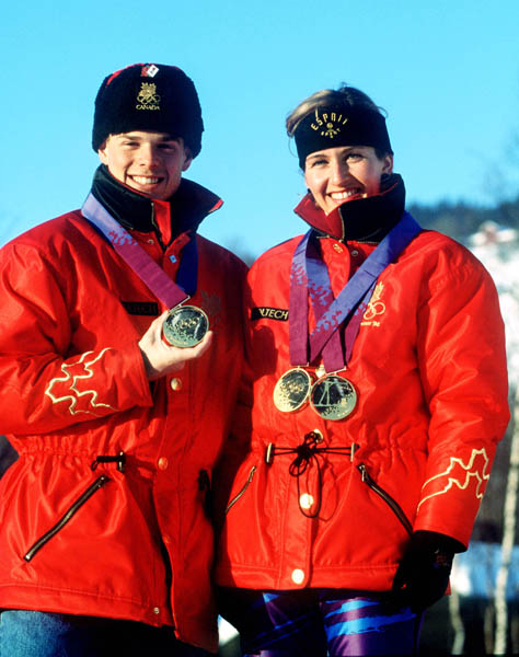 Canada's Jean-Luc Brassard and Myriam Bedard celebrate their gold medal wins at the 1994 winter Olympics in Lillehammer. (CP Photo/ COA/ Claus Andersen)