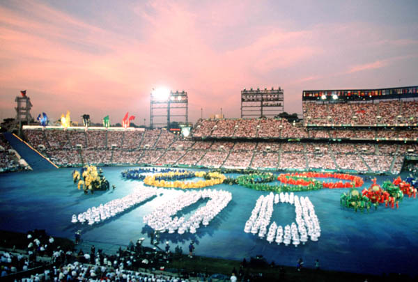 Participants perform during the opening ceremony of the 1996 Atlanta Olympic Games. (CP Photo/ COA/Mike Ridewood)