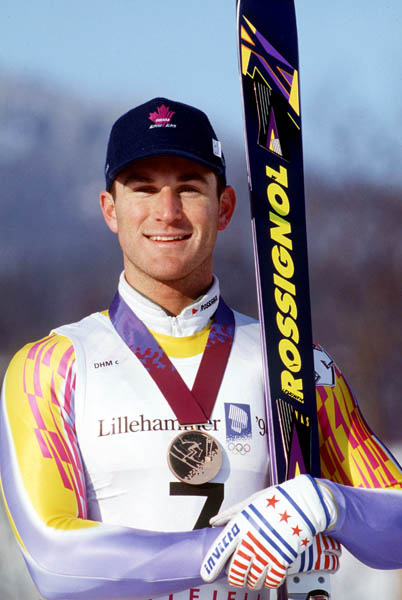 Canada's Edi Podivinski shows off the bronze medal he won for the men's downhill ski event at the 1994 Lillehammer Winter Olympics. (CP PHOTO/ COA/ Claus Andersen)