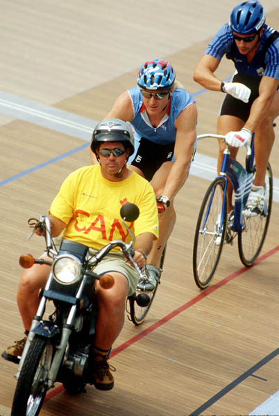 Canada's Curt Harnett (centre) competes in the track cycling event at the 1996 Olympic games in Atlanta. (CP PHOTO/ COA/ Mike Ridewood)