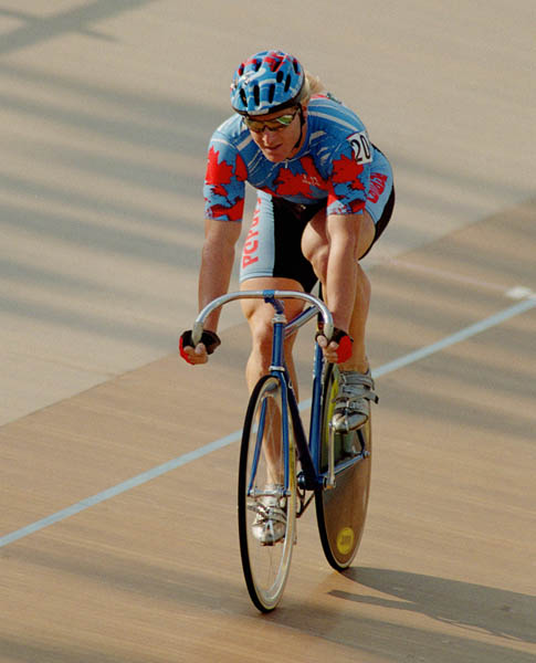 Canada's Curt Harnett competes in the track cycling event at the 1998 Olympic games in Atlanta. (CP PHOTO/ COA/ Mike Ridewood)