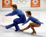 Canada's Paul Martini (left), Barbara Underhill and coach Louis Stong wait for scores during the figure skating-pairs event at the 1984 Sarajevo Olympic winter Games. (CP PHOTO/COA/Tim O'lett)