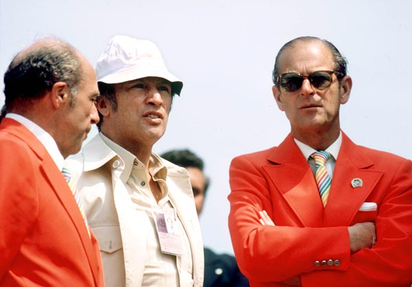 Canadian Prime Minister Pierre Elliott Trudeau (centre) speaks with the His Royal Highness the Duke of Edinbugh Prince Phillip (right) at the 1976 Summer Olympic games in Montreal. (CP Photo/COA/RW)