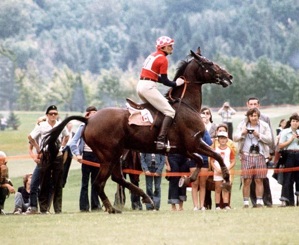 Canada's Cathy Wedge rides City Fella in an equestrian event at the 1976 Montreal Olympic games. (CP PHOTO/ COA/MB)
