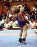 Canada's Howard Stupp (red) competes in the wrestling event at the 1976 Olympic games in Montreal. (CP PHOTO/ COA/RW)