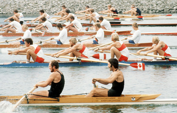 Canada's Ian Gordon, Phil Monckton, Andy Van Ruyven and Brian Dick (red and white) compete in the men's 4x rowing event at the 1976 Montreal Olympic Games. (CP Photo/COA)