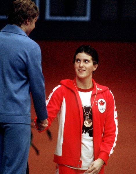 Canada's Shannon Smith (right) celebrates her bronze medal win in the swimming event at the 1976 Olympic games in Montreal. (CP PHOTO/ COA/Ted Grant)