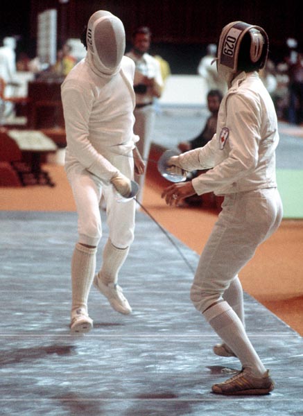 Canada's Marc Lavoie (right) competes in the fencing event at the 1976 Olympic games in Montreal. (CP PHOTO/ COA/ BB)