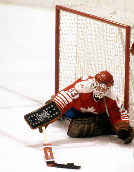 Canada's Mario Gosselin reaches for the puck during hockey action against Finland at the 1984 Winter Olympics in Sarajevo. (CP PHOTO/ COA/ J.Merrithew )