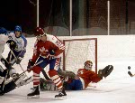 Canada's Mario Gosselin (goalie) keep his eyes on the puck during hockey action against Austria at the 1984 Winter Olympics in Sarajevo. (CP PHOTO/ COA/ O. Bierwagon)